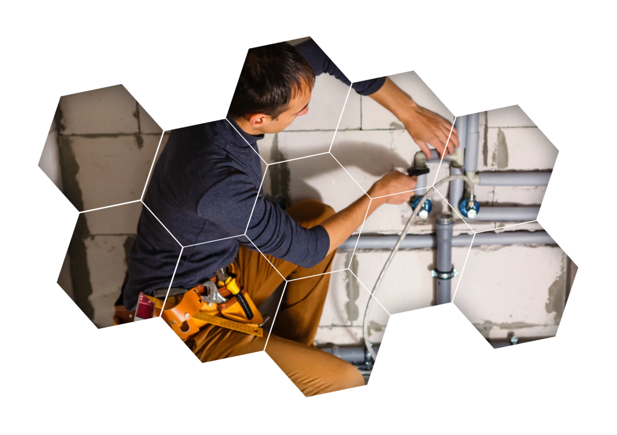 plombier polonais fixant une canalisation